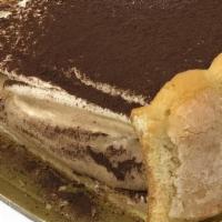 Tiramisu · Layered with cream and coffee syrup, dusted with cocoa powder, and finished with lady fingers