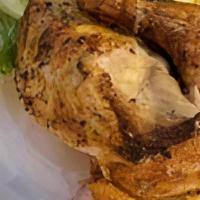 Half Rotisserie Chicken · Cooked daily in our rotisserie oven until it falls off of the bone. Choose BBQ or Lemon Pepp...