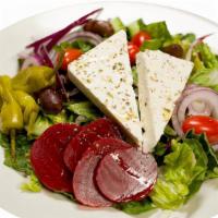 Greek Salad · Crisp romaine tossed in our house dressing topped with Kalamata olives, pepperoncini, cucumb...