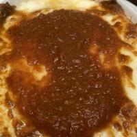 Meat Lasagna · Our old family recipe; made from scratch with wide noodles, seasoned ground beef and Italian...