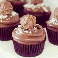 Nutella · Chocolate cake with chocolate filling. Topped with Nutella icing & white sprinkles with a Fe...