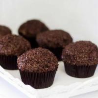 Chocolate Bomb · Decadent chocolate cake with chocolate filling. Chocolate mousse icing dipped in chocolate s...