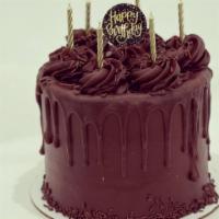Double Chocolate Cake · 6-inch Chocolate cake with chocolate buttercream filling and icing. Serves 8-10.