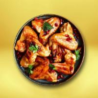 Traditional Chicken Wings (7 Pcs) · 7 pieces of chicken wings served with celery sticks and dressing.