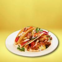 Courageous Chicken Taco Combo · This taco is filled with our specially seasoned chicken and cilantro and onions.