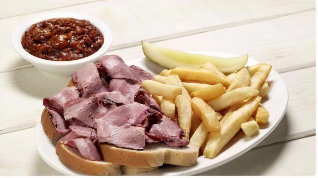 1 Meat Classic Plate · Sliced beef, ham, turkey, sausage, pork burnt ends, or pulled pork. Served over bread with your choice of two classic sides, pickle, and sauce.