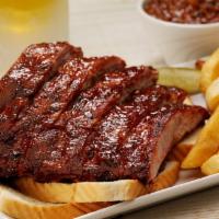 Rib Plate · Includes your choice of two classic sides.