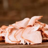 Sliced Turkey · Hickory-smoked turkey breast sliced thin.