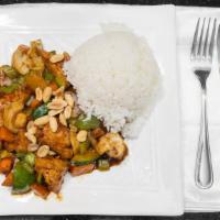 Kung Pao Tofu · Spicy. Served with vegetable fried rice or steamed rice and egg roll or two pieces of crab r...