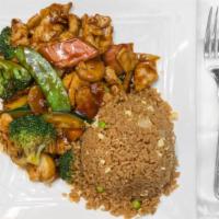 Chicken With Mixed Vegetable · Served with vegetable fried rice or steamed rice and egg roll or two pieces of crab rangoon.