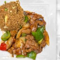 Pepper Steak With Onion · Served with vegetable fried rice or steamed rice and egg roll or two pieces of crab rangoon.