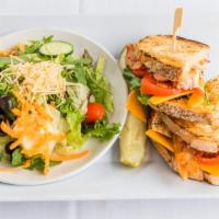 Grilled Chicken Club Sandwich · rosemary chicken, bacon, cheddar, lettuce, tomato, sourdough bread with basil pesto mayo, or...