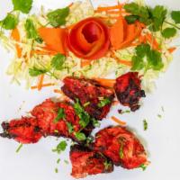 Half Chicken Tandoori · Half chicken marinated in yogurt and Bhutanese, Nepali or Indian herbs and spices. Served wi...