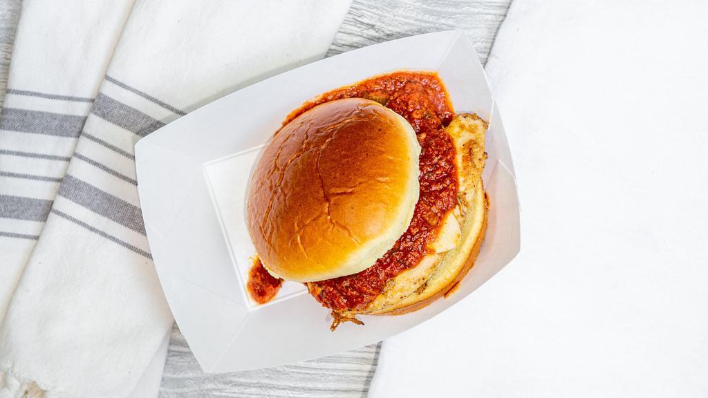 Chicken Parmesan Sandwich · Grilled chicken breast on a brioche bun with mozzarella and our homemade red sauce.
