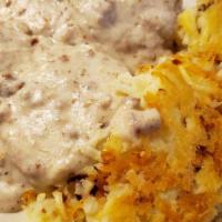 Biscuits & Gravy · Two biscuits with hash brows included.