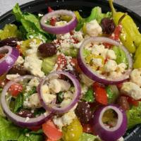 Greek Salad · Romaine lettuce, feta cheese, kalamata olives, tomatoes, red onion, banana peppers and peppe...