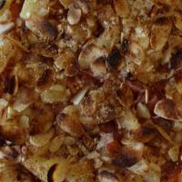 Tammys Hawaiian · Tammy's Pizza Sauce, Wisconsin Cheese, Ham, Pineapple, . Cinnamon and Almonds
