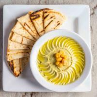  Hummus · Vegetarian. Chickpea, tahini, avocado & cilantro dip with pita bread.