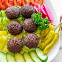 Falafel · Served with vegetables and tahini.