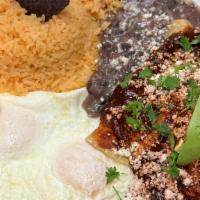 Breakfast Enchiladas · Three Corn Tortillas Stuffed With Low Fat Mozzarella Cheese. Topped With Home Made Chili Sal...