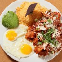 Red Chilaquiles · Home made tortilla chips sautéed in spicy salsa roja with queso fresco, chopped white onions...