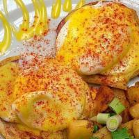 Eggs Benedict · Two poached eggs and Canadian bacon on an English muffin. Drizzled with hollandaise sauce. C...