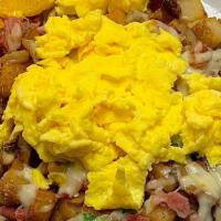 Café Skillet · Two Eggs, diced ham, onions, mushrooms, green peppers and melted jack cheese. Choice of Toas...