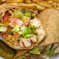 Chipotle Wrap · Fried chicken tenders, cheddar cheese, lettuce, tomatoes, avocado, cilantro and chipotle ran...
