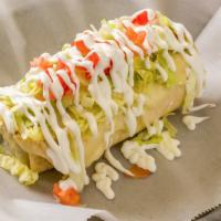 Supreme · Burrito with your choice of beef or chicken, stuffed with beans, melted cheese, guacamole, l...