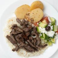 Beef Shawarma · Slices of beef seasoned and grilled rotisserie style.
