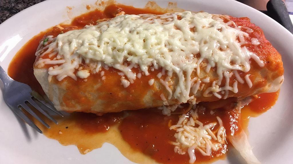 Burrito Suizo · Comes with sour cream and guacamole topped with our ranchero sauce and melted cheese.