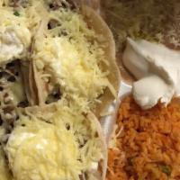 Taco Dinner Build It Your Way · Choose any combination of tacos. ​Add rice, beans and sour cream for an additional charge.
