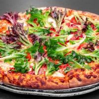Large Robert Browning Pizza · Capicola ham, Genoa salami, pepperoni, banana peppers, mixed greens, with Italian dressing