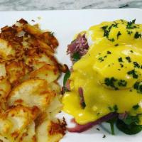 Loraine Benedict · Poached eggs, prosciutto and spinach on challah toast and hollandaise sauce.