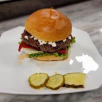 Zeus Burger · Ground lamb patty, roasted red pepper, tzatziki, lettuce, tomato, pickle and goat cheese.