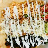 Taco Salad · Lettuce, chihuahua cheese, black beans, mexican rice, pico de gallo, guacamole, sour cream, ...