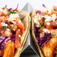 Camarón Taco · Chipotle shrimp, queso fresco, pickled purple cabbage, pico de gallo. served in flour tortil...