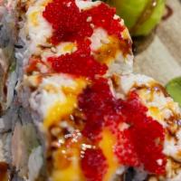 Mermaid Roll · Select salmon temp,cream cheese, avocado inside,top w.snow crab mix,masago served w.eel sauc...