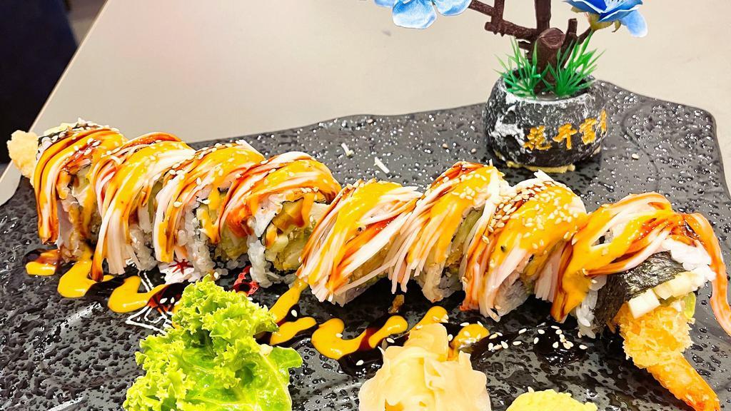 Shaggy Dog Roll · Shrimp tempura, avocado, cream cheese, cucumber  inside, crab sticks on top