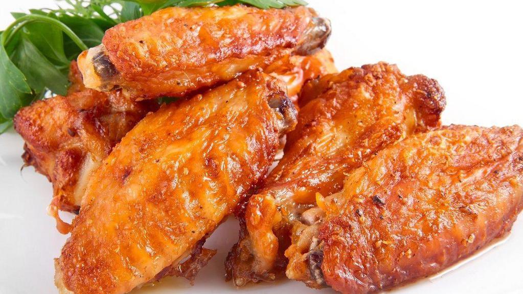 Chicken Wings · BBQ or Buffalo served with creamy blue and celery.