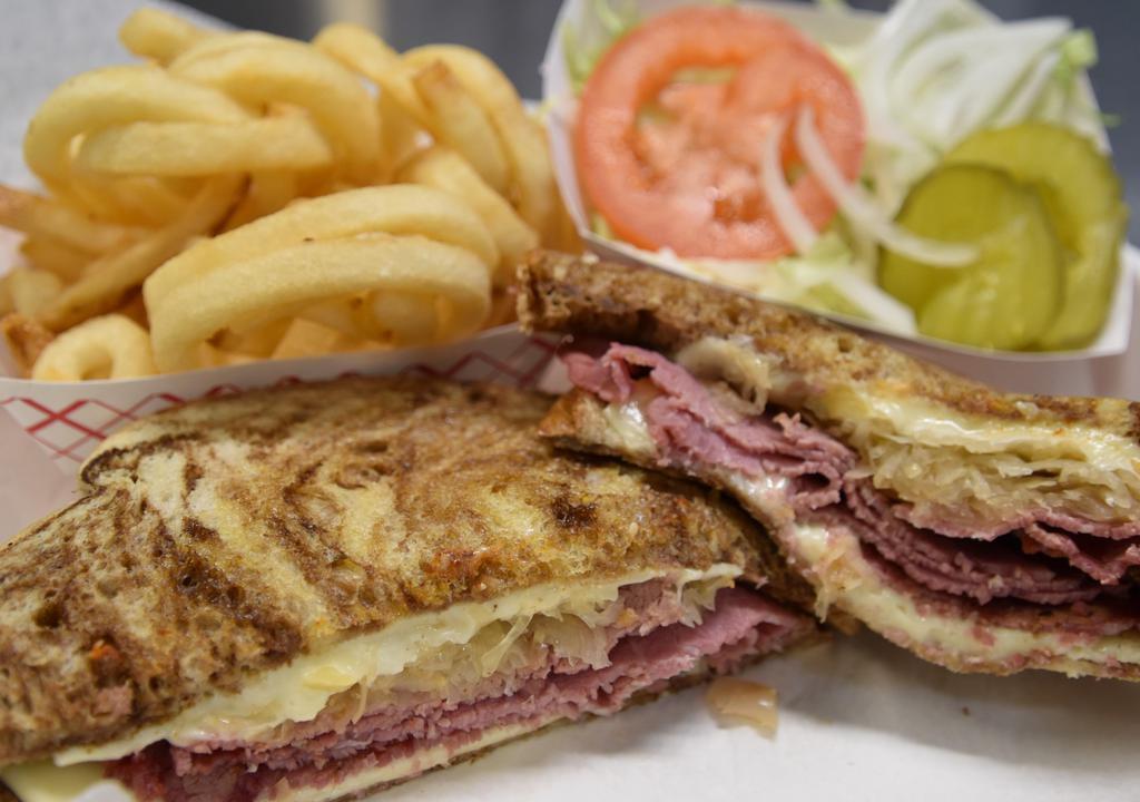 Reuben Sandwich · Corned beef with sauerkraut and Swiss cheese.