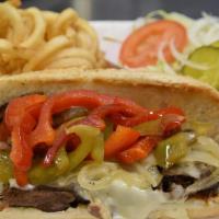 Philly Cheese Steak Sandwich · McGonigle's thin sliced top sirloin with red and green peppers, grilled onions, and Swiss ch...