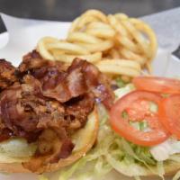 Blt Sandwich · Colossal 1/4 lb. smoked bacon on a bed of lettuce and tomatoes.