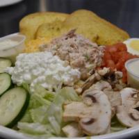 Julie'S Fave Salad · Scoop of tuna and cottage cheese served atop a bed of fresh iceberg lettuce, tomato, cucumbe...