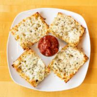 Garlic Cheese Bread · Locally crafted Italian baguette loaded with mozzarella cheese and garlic butter. We finish ...