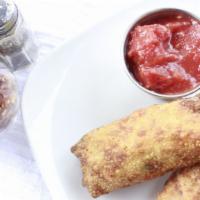 Hand Rolled Italian Egg Rolls · Hand-stuffed with spicy Italian sausage, organic bell peppers, organic spinach, organic red ...
