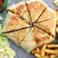 Chicken Shawarma Halabi · A very specialblend of shawarma and cheese, comes with pickles and garlic sauce topped with ...