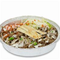 Gyros Over Rice · Own style plate comes with gyros, onions and green peppers, tomatoes, lettuce, and famous wh...