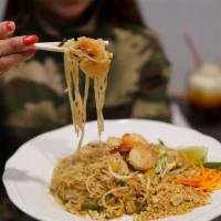 L-Pad Thai · Thin rice noodles wok tossed with egg, your choice of meat, green onions, and bean sprouts, ...