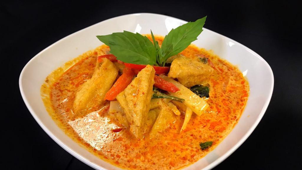 L- Red Curry · Your choice of meat with eggplant, bamboo, red bell peppers, and basil simmered in red curry and coconut milk. It comes mildly.
 *Gluten-free.